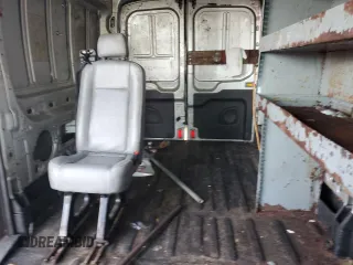 2015 Ford Transit with VIN 1FTNR2CG3FKA61677, listed as a Copart auction lot 87996715 with 178,460 mi miles and Salvage Title. Bid and sale history available at DreamBid. Image 10.