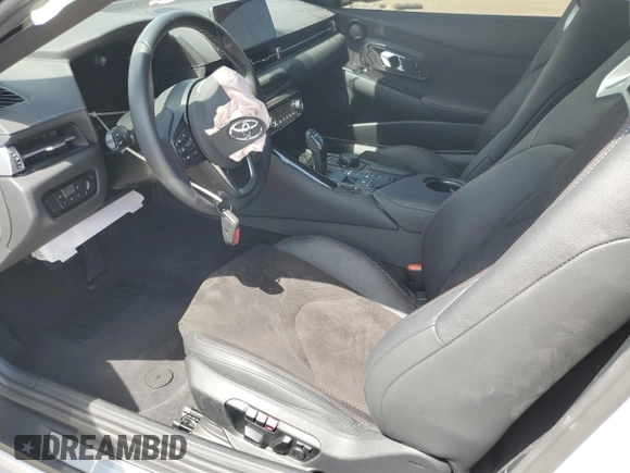 2025 Toyota GR Supra 3.0 with VIN WZ1DB0G09SW069188, listed as a Copart auction lot 49242215 with 0 mi miles and Salvage Title. Bid and sale history available at carsss.com. Image 7.
