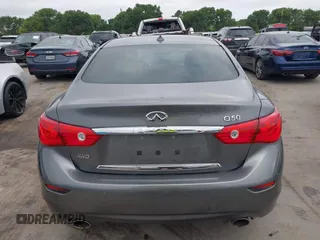 2015 Infiniti Q50 Premium z VIN JN1BV7AR7FM408015, wystawiony jako IAAI lot #42083301 z przebiegiem 58 817 mil mil oraz . Historia ofert i sprzedaży dostępna na DreamBid. Obrazek 16.