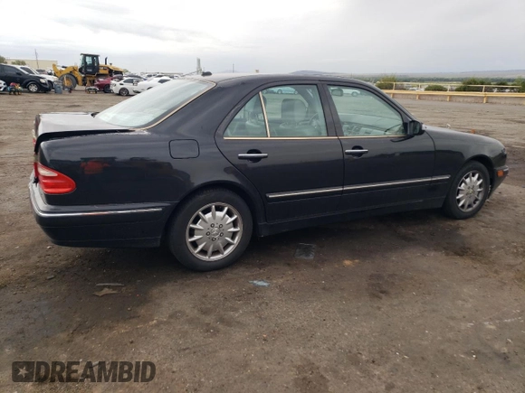 2000 Mercedes-Benz E-Class with VIN WDBJF65J5YB068297, listed as a Copart auction lot 69199004 with 236,751 mi miles and Salvage Title. Bid and sale history available at carsss.com. Image 3.