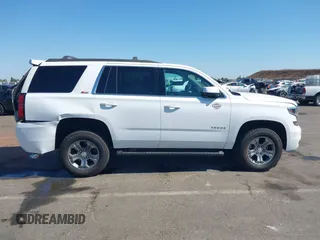 2017 Chevrolet Tahoe LT with VIN 1GNSKBKC4HR356570, listed as a IAAI auction lot 42762093 with 146,679 mi miles and . Bid and sale history available at DreamBid. Image 14.