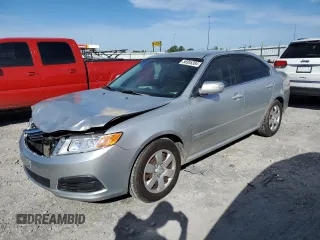 2010 Kia Optima LX z VIN KNAGG4A85A5407416, wystawiony jako Copart lot #71970634 z przebiegiem 194 869 mil mil oraz Szkoda całkowita • Salvage title. Historia ofert i sprzedaży dostępna na DreamBid. Obrazek 1.