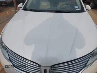 2016 Lincoln MKZ z VIN 3LN6L2GK1GR604523, wystawiony jako IAAI lot #42005012 z przebiegiem 215 285 mil mil oraz . Historia ofert i sprzedaży dostępna na DreamBid. Obrazek 10.