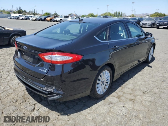 2015 Ford Fusion SE Hybrid with VIN 3FA6P0LUXFR296616, listed as a Copart auction lot 60563645 with 134,844 mi miles and Salvage title. Bid and sale history available at DreamBid. Image 3.