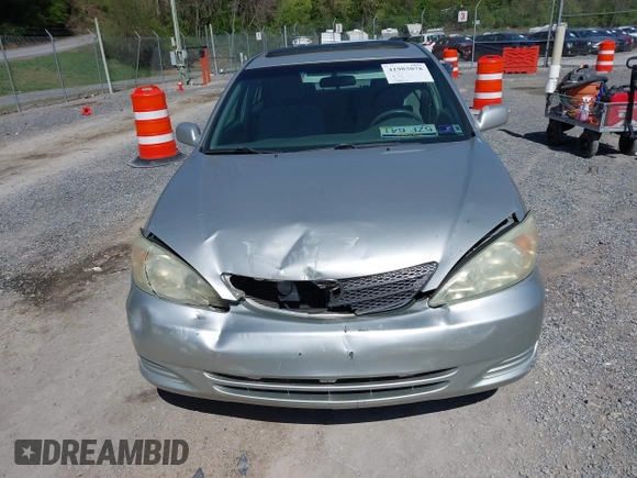 2004 Toyota Camry LE with VIN 4T1BE30K14U290983, listed as a IAAI auction lot 41983078 with 174,852 mi miles and . Bid and sale history available at carsss.com. Image 6.