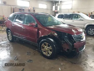 2015 Chevrolet Traverse LT z VIN 1GNKVHKD0FJ340901, wystawiony jako IAAI lot #41545181 z przebiegiem 129 590 mil mil oraz . Historia ofert i sprzedaży dostępna na DreamBid. Obrazek 1.