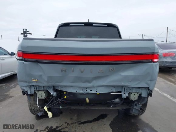 2023 Rivian R1T Launch Edition with VIN 7FCTGAAL3PN017339, listed as a IAAI auction lot 42041423 with 15,098 mi miles. Bid and sale history available at carsss.com. Image 17.
