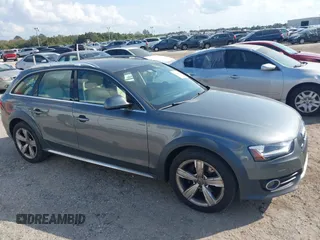 2014 Audi allroad Premium Plus with VIN WA1UFAFL7EA006011, listed as a IAAI auction lot 41494881 with 70,461 mi miles. Bid and sale history available at carsss.com. Image 13.