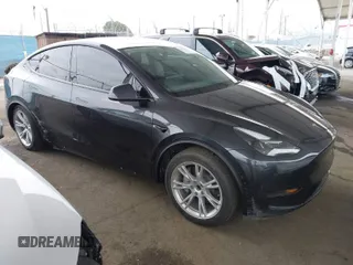 2024 Tesla Model Y with VIN 7SAYGDED8RF039678, listed as a IAAI auction lot 42057006 with 32,770 mi miles and . Bid and sale history available at DreamBid. Image 1.