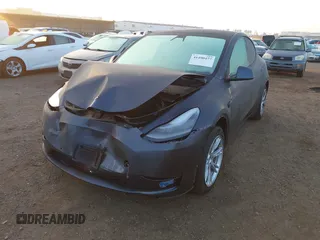 2021 Tesla Model Y Standard Range z VIN 5YJYGDED4MF121963, wystawiony jako IAAI lot #41490477 z przebiegiem 41 941 mil mil oraz . Historia ofert i sprzedaży dostępna na DreamBid. Obrazek 19.