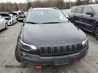 2022 Jeep Cherokee Trailhawk with VIN 1C4PJMBX3ND502322, listed as a Copart auction lot 85561444 with 57,630 mi miles and Salvage Title. Bid and sale history available at carsss.com. Image 5.