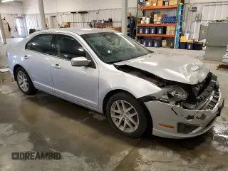2012 Ford Fusion SEL with VIN 3FAHP0JG2CR274840, listed as a Copart auction lot 62123135 with 122,517 mi miles and Salvage title. Bid and sale history available at DreamBid. Image 4.