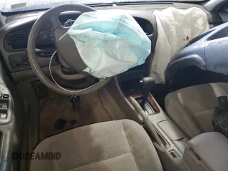 2000 Nissan Altima XE z VIN 1N4DL01D2YC237552, wystawiony jako Copart lot #57958785 z przebiegiem Nie podano mil oraz Szkoda całkowita • Salvage title. Historia ofert i sprzedaży dostępna na DreamBid. Obrazek 8.