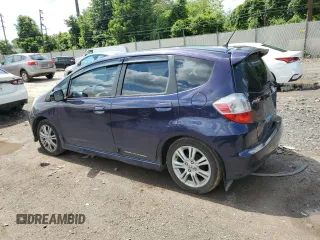 2010 Honda Fit Sport with VIN JHMGE8H44AC013385, listed as a Copart auction lot 63216515 with 228,358 mi miles and Salvage title. Bid and sale history available at DreamBid. Image 2.