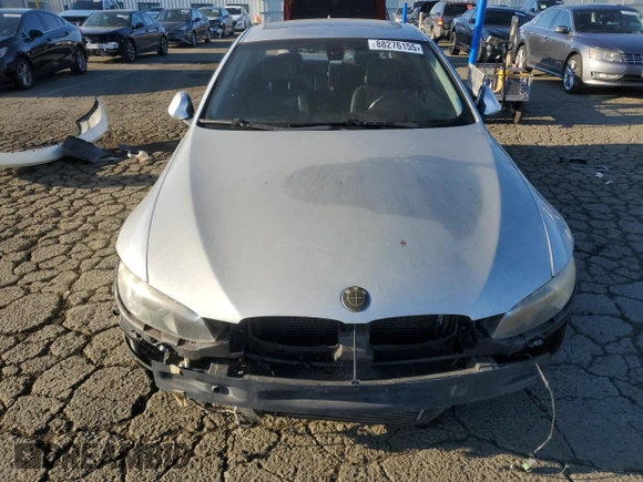 2007 BMW 3 Series 335i with VIN WBAWB73537PV82615, listed as a Copart auction lot 88276155 with 128,843 mi miles and Salvage Title. Bid and sale history available at carsss.com. Image 5.