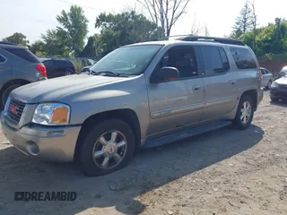 2003 GMC Envoy SLT with VIN 1GKES16S336101568, listed as a IAAI auction lot 40187998 with 185,402 mi miles. Bid and sale history available at carsss.com. Image 2.