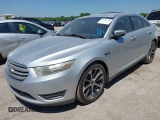 2014 Ford Taurus SEL z VIN 1FAHP2E88EG131304, wystawiony jako IAAI lot #42193759 z przebiegiem 174 465 mil mil oraz . Historia ofert i sprzedaży dostępna na DreamBid. Obrazek 2.