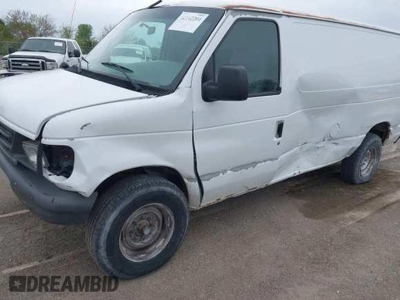 2006 Ford Econoline Cargo with VIN 1FTNE24W86DA21116, listed as a IAAI auction lot 42142204 with 133,272 mi miles and . Bid and sale history available at DreamBid. Image 6.