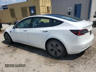 2023 Tesla Model 3 с VIN 5YJ3E1EA7PF447006, выставлен на аукционе Copart как лот 62788355 с пробегом 134 951 миль миль и Чистый • Clean title. История ставок и продаж доступна на DreamBid. Изображение 2.