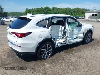 2022 Acura MDX Technology with VIN 5J8YE1H44NL035939, listed as a IAAI auction lot 42547724 with 45,642 mi miles and . Bid and sale history available at DreamBid. Image 4.