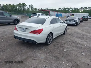 2014 Mercedes-Benz CLA 250 with VIN WDDSJ4EBXEN052730, listed as a IAAI auction lot 42653232 with 152,303 mi miles and . Bid and sale history available at DreamBid. Image 4.