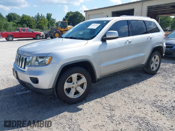 2011 Jeep Grand Cherokee Laredo with VIN 1J4RR4GG2BC714893, listed as a IAAI auction lot 42750763 with 184,475 mi miles and . Bid and sale history available at DreamBid. Image 2.