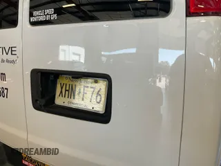 2019 Chevrolet Express Cargo Van with VIN 1GCWGAFP2K1202013, listed as a IAAI auction lot 42201471 with 207,301 mi miles. Bid and sale history available at carsss.com. Image 1.