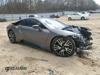2015 BMW i8 z VIN WBY2Z2C52FV391003, wystawiony jako Copart lot #49772875 z przebiegiem Nie podano mil oraz Szkoda całkowita • Salvage title. Historia ofert i sprzedaży dostępna na DreamBid. Obrazek 4.