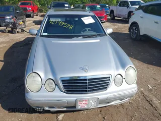 2001 Mercedes-Benz E-Class with VIN WDBJF65J61B373135, listed as a IAAI auction lot 42149598 with 123,314 mi miles. Bid and sale history available at carsss.com. Image 6.
