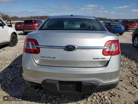 2012 Ford Taurus SEL z VIN 1FAHP2HW7CG138459, wystawiony jako Copart lot #53170075 z przebiegiem 194 617 mil mil oraz Czysty tytuł • Clean title. Historia ofert i sprzedaży dostępna na DreamBid. Obrazek 6.