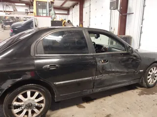 2003 Hyundai Sonata GLS with VIN KMHWF35H33A782779, listed as a IAAI auction lot 41702937 with 285,264 mi miles. Bid and sale history available at carsss.com. Image 14.