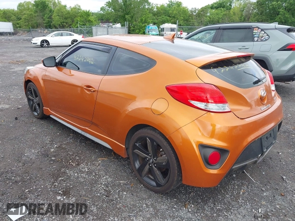 2013 Hyundai Veloster Turbo z VIN KMHTC6AE3DU124744, wystawiony jako IAAI lot #42242242 z przebiegiem 115 757 mil mil oraz . Historia ofert i sprzedaży dostępna na DreamBid. Obrazek 3.