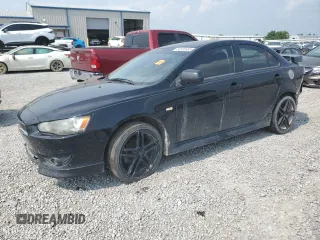 2012 Mitsubishi Lancer SE with VIN JA32V2FW4CU016652, listed as a Copart auction lot 58593485 with Not provided miles and Salvage title. Bid and sale history available at DreamBid. Image 1.