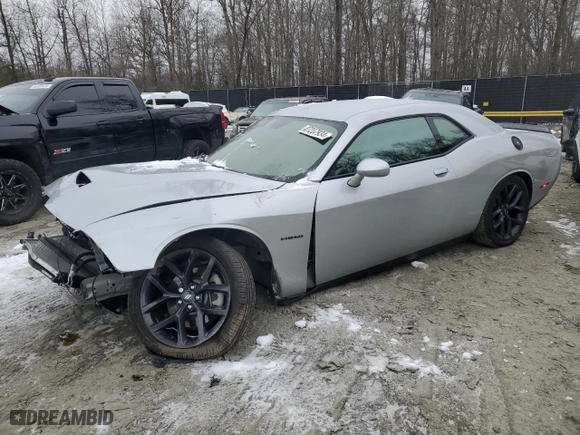 2021 Dodge Challenger R/T with VIN 2C3CDZBTXMH631308, listed as a Copart auction lot 88821085 with 57,259 mi miles and Salvage Title. Bid and sale history available at carsss.com. Image 1.