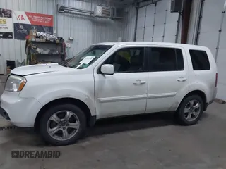 2015 Honda Pilot EX-L with VIN 5FNYF4H59FB023814, listed as a IAAI auction lot 41161235 with 216,437 mi miles and . Bid and sale history available at carsss.com. Image 14.