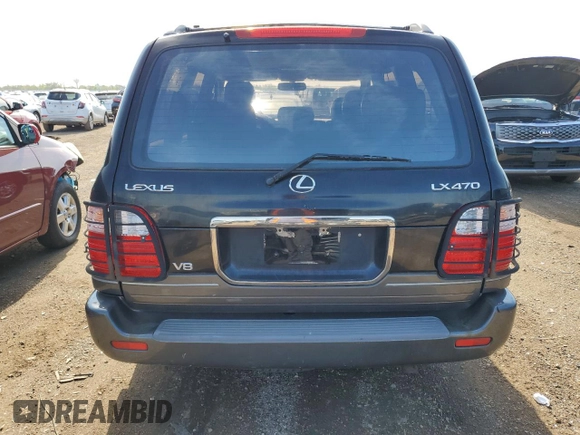 2002 Lexus LX 470 z VIN JTJHT00W923521442, wystawiony jako Copart lot #55936255 z przebiegiem 184 103 mil mil oraz Tytuł czysty. Historia ofert i sprzedaży dostępna na DreamBid. Obrazek 6.