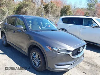 2017 Mazda CX-5 Touring with VIN JM3KFBCL2H0203497, listed as a IAAI auction lot 41860782 with 65,482 mi miles. Bid and sale history available at carsss.com. Image 1.