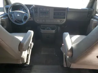 2013 Chevrolet Express Passenger 1LT z VIN 1GAZGYFG5D1190358, wystawiony jako Copart lot #75496574 z przebiegiem 114 340 mil mil oraz Szkoda całkowita • Salvage title. Historia ofert i sprzedaży dostępna na DreamBid. Obrazek 8.