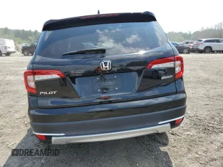 2020 Honda Pilot Touring 8-Passenger with VIN 5FNYF5H95LB021658, listed as a Copart auction lot 58878594 with 36,122 mi miles and Salvage Title. Bid and sale history available at DreamBid. Image 6.