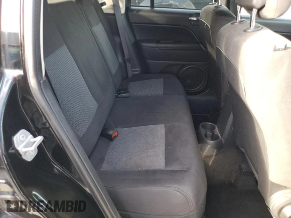 2016 Jeep Compass Sport with VIN 1C4NJDBB1GD521904, listed as a Copart auction lot 65169062 with 125,228 mi miles. Bid and sale history available at carsss.com. Image 6.