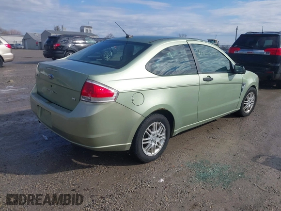 2008 Ford Focus SE with VIN 1FAHP33N08W140376, listed as a IAAI auction lot 41661418 with 174,630 mi miles. Bid and sale history available at carsss.com. Image 4.