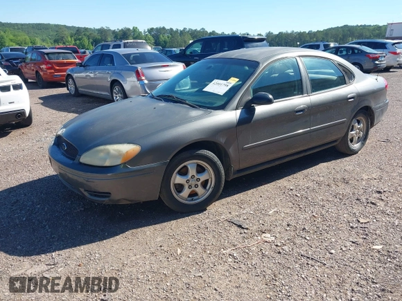 2005 Ford Taurus SE with VIN 1FAFP532X5A272398, listed as a IAAI auction lot 42001798 with 159,199 mi miles. Bid and sale history available at carsss.com. Image 2.