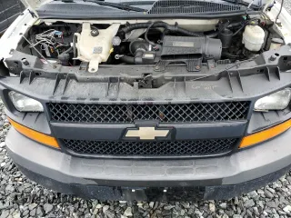 2013 Chevrolet Express Cargo z VIN 1GCWGFFA7D1103926, wystawiony jako Copart lot #55557045 z przebiegiem 284 824 mil mil oraz Tytuł czysty. Historia ofert i sprzedaży dostępna na DreamBid. Obrazek 11.