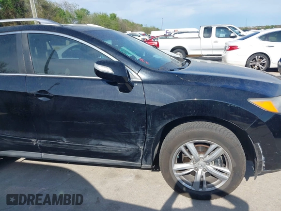 2014 Acura RDX Technology with VIN 5J8TB3H55EL001838, listed as a IAAI auction lot 41876530 with 214,266 mi miles and . Bid and sale history available at DreamBid. Image 21.