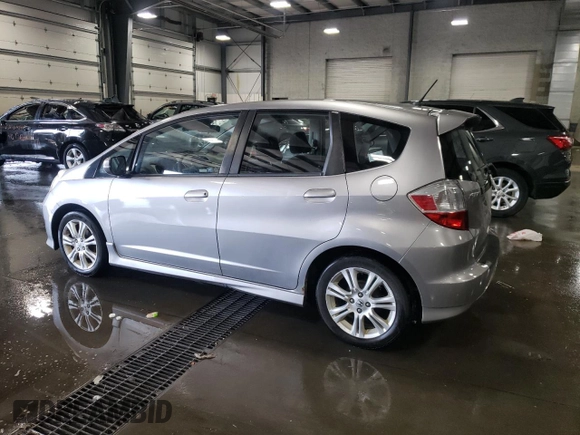 2010 Honda Fit Sport with VIN JHMGE8H40AS027600, listed as a Copart auction lot 62880684 with 271,289 mi miles and Salvage Title. Bid and sale history available at carsss.com. Image 2.