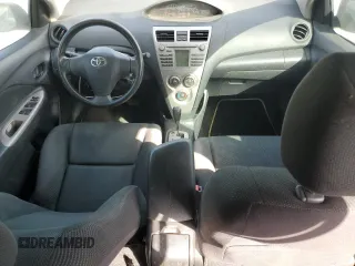 2009 Toyota Yaris with VIN JTDBT903591336734, listed as a Copart auction lot 47306025 with 160,053 mi miles and Salvage Title. Bid and sale history available at carsss.com. Image 8.