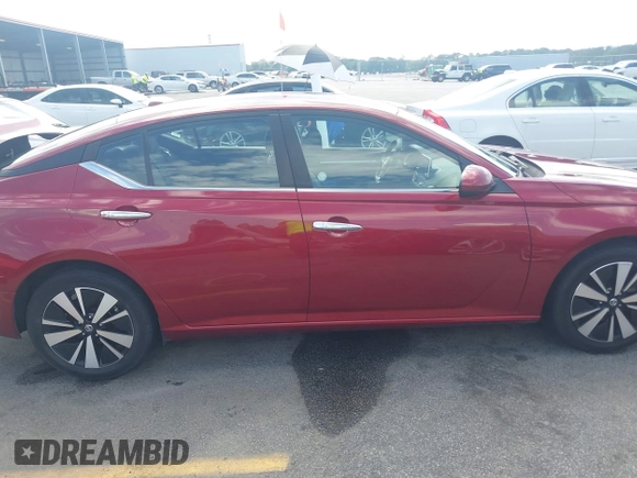 2022 Nissan Altima SV z VIN 1N4BL4DV5NN307810, wystawiony jako IAAI lot #42210773 z przebiegiem 135 459 mil mil oraz . Historia ofert i sprzedaży dostępna na DreamBid. Obrazek 13.