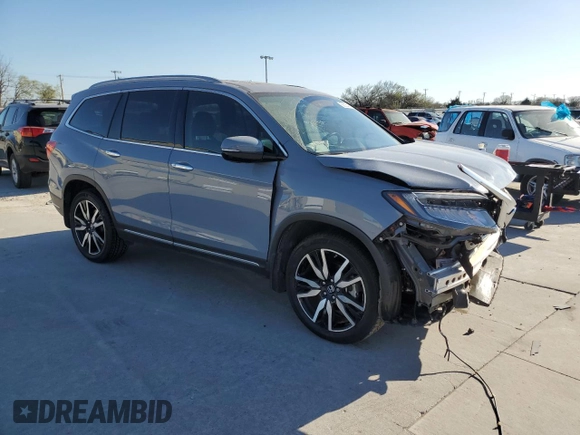 2022 Honda Pilot Elite z VIN 5FNYF6H0XNB060420, wystawiony jako Copart lot #50035415 z przebiegiem 37 288 mil mil oraz Szkoda całkowita • Salvage title. Historia ofert i sprzedaży dostępna na DreamBid. Obrazek 4.
