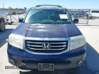 2013 Honda Pilot Touring with VIN 5FNYF3H94DB018384, listed as a IAAI auction lot 41672767 with 188,922 mi miles and . Bid and sale history available at DreamBid. Image 12.