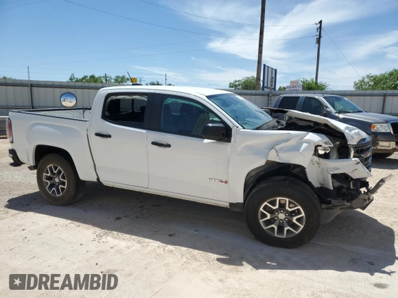 2022 GMC Canyon 4WD AT4 with VIN 1GTG6FEN2N1210072, listed as a Copart auction lot 53247005 with 64,897 mi miles and Salvage Title. Bid and sale history available at carsss.com. Image 4.